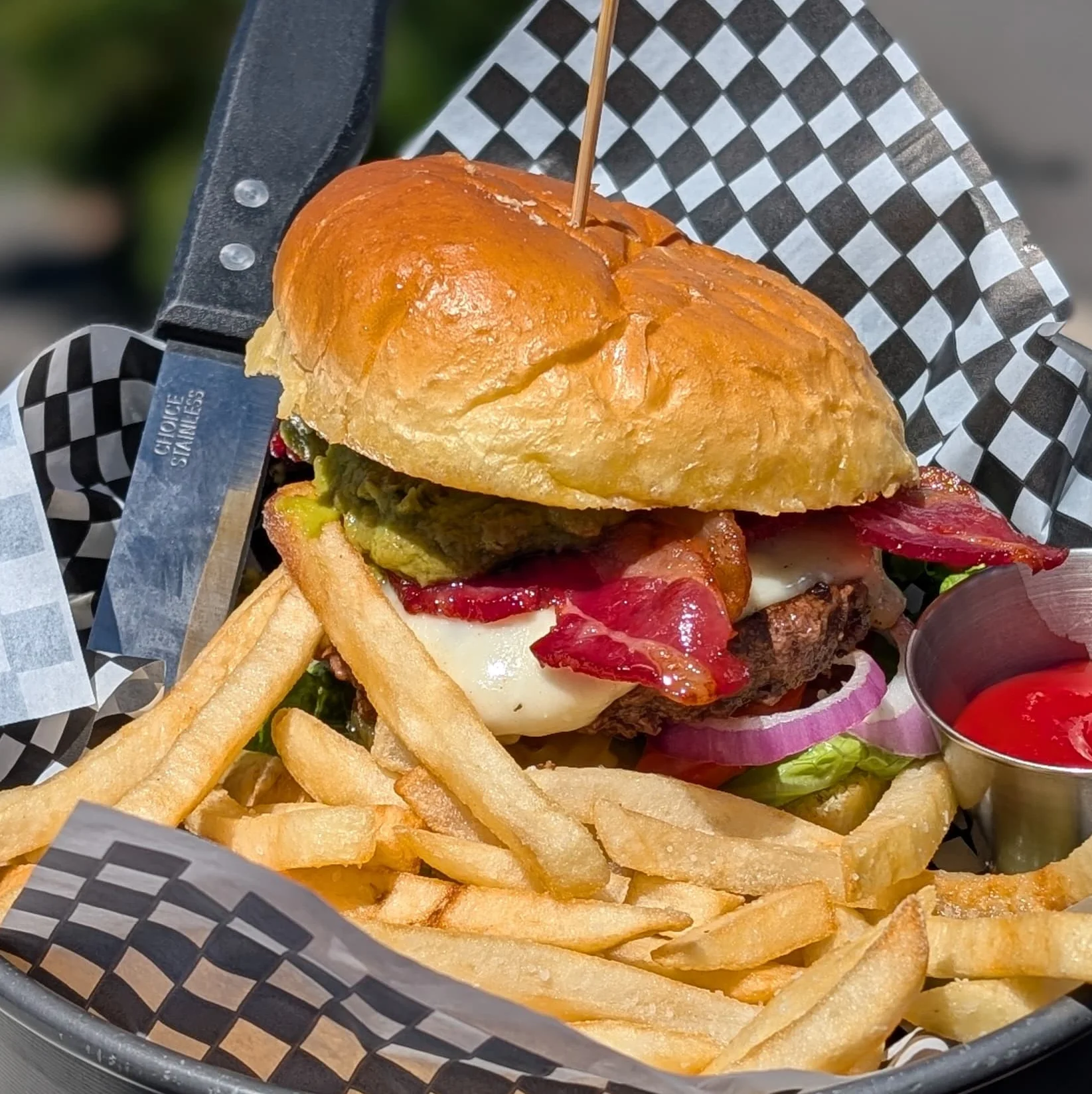 Juicy American cheeseburger with fries