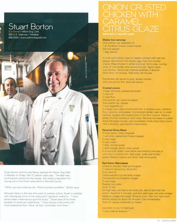 Chef presenting onion crusted chicken dish with citrus glaze