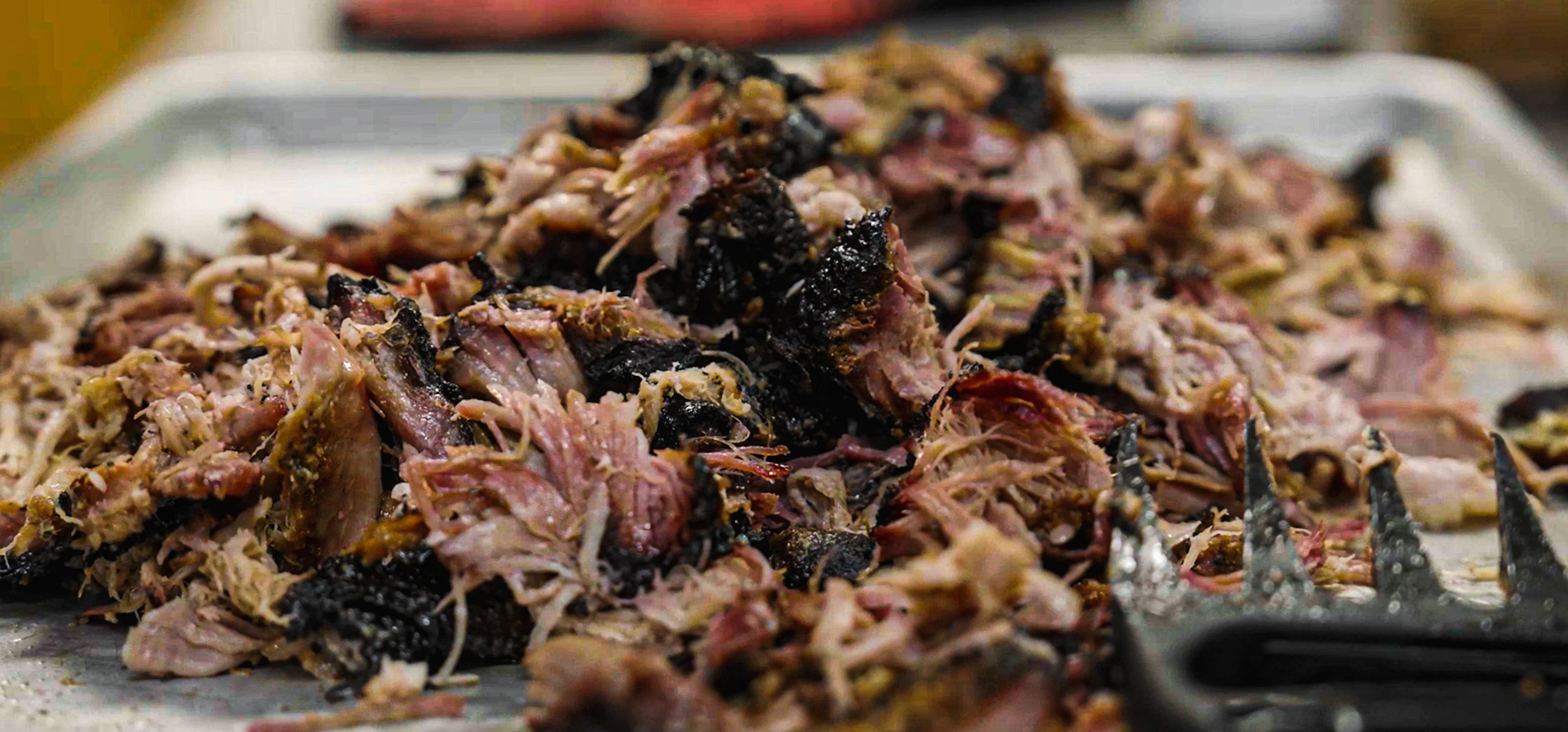 Pulled pork barbecue served on a platter