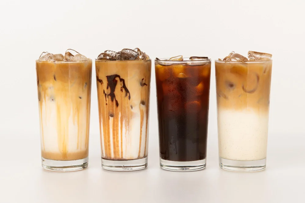 Assorted iced coffee drinks in tall glasses