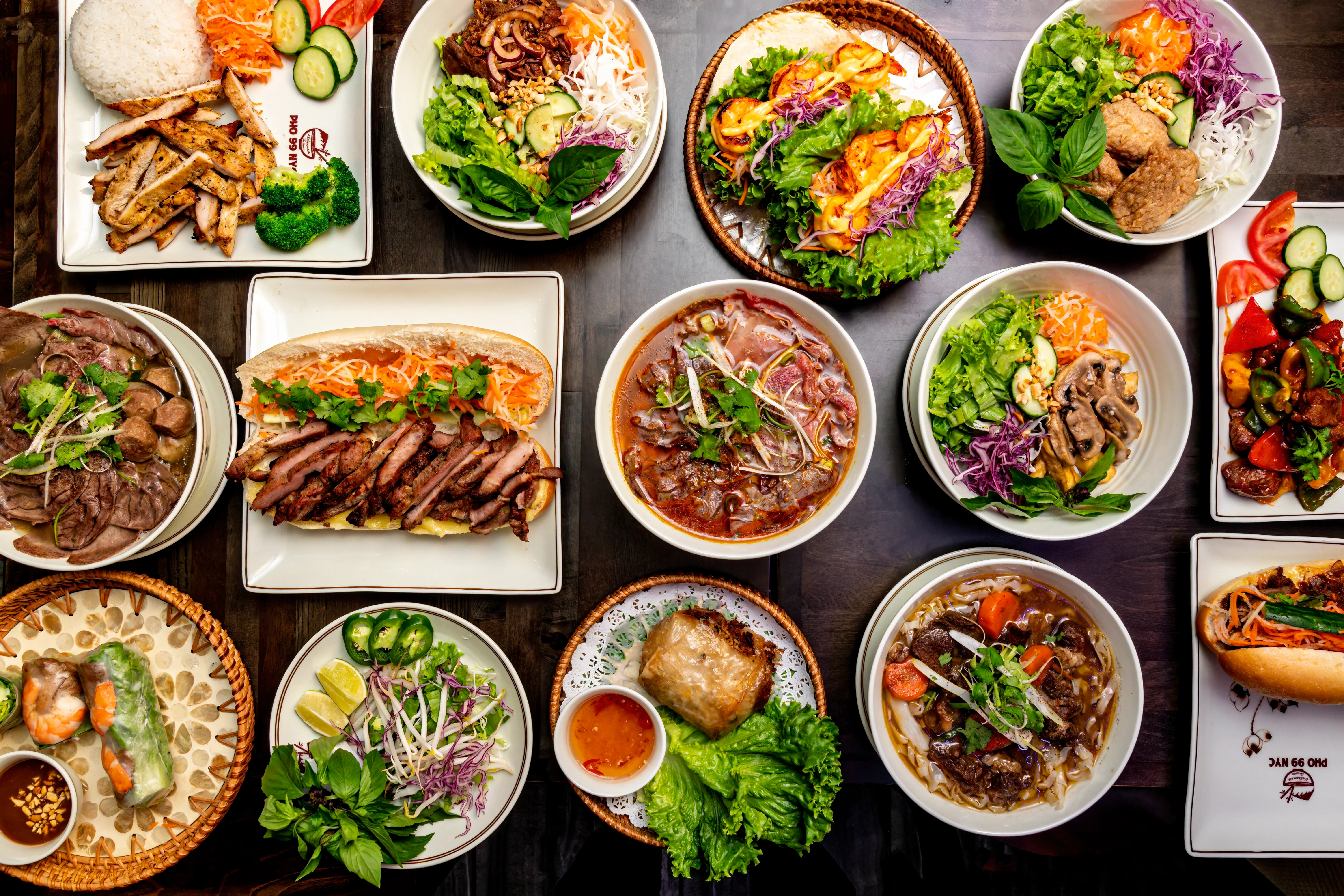 Assorted Vietnamese dishes including pho and banh mi