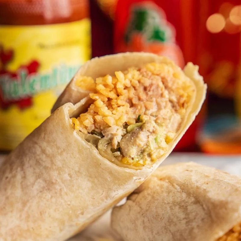Delicious chicken burrito with rice and creamy filling