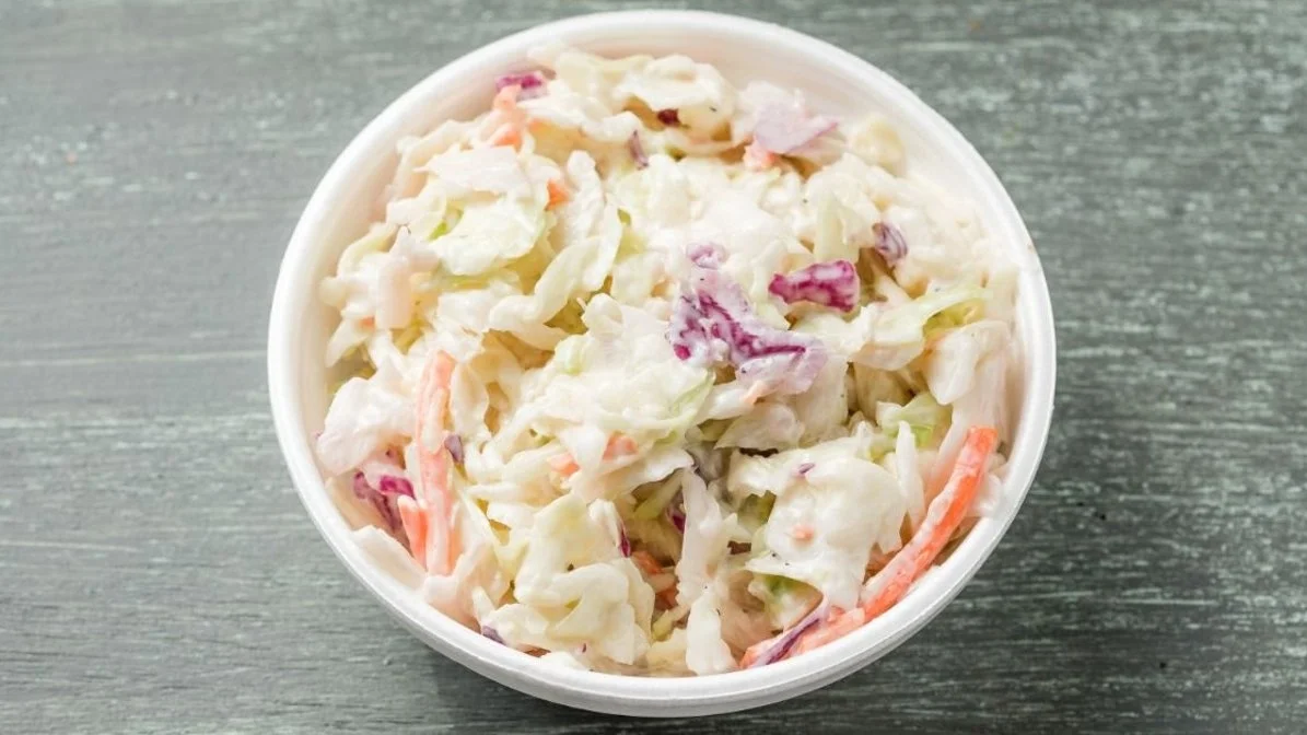 Cole slaw from VooDoo BBQ in Pensacola, a creamy cabbage and carrot side dish.
