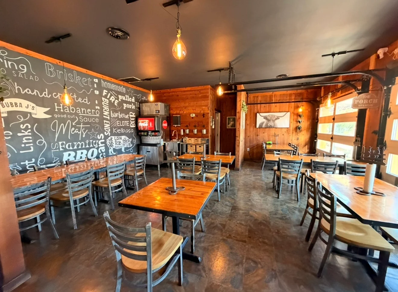 Cozy restaurant interior with rustic decor and warm lighting