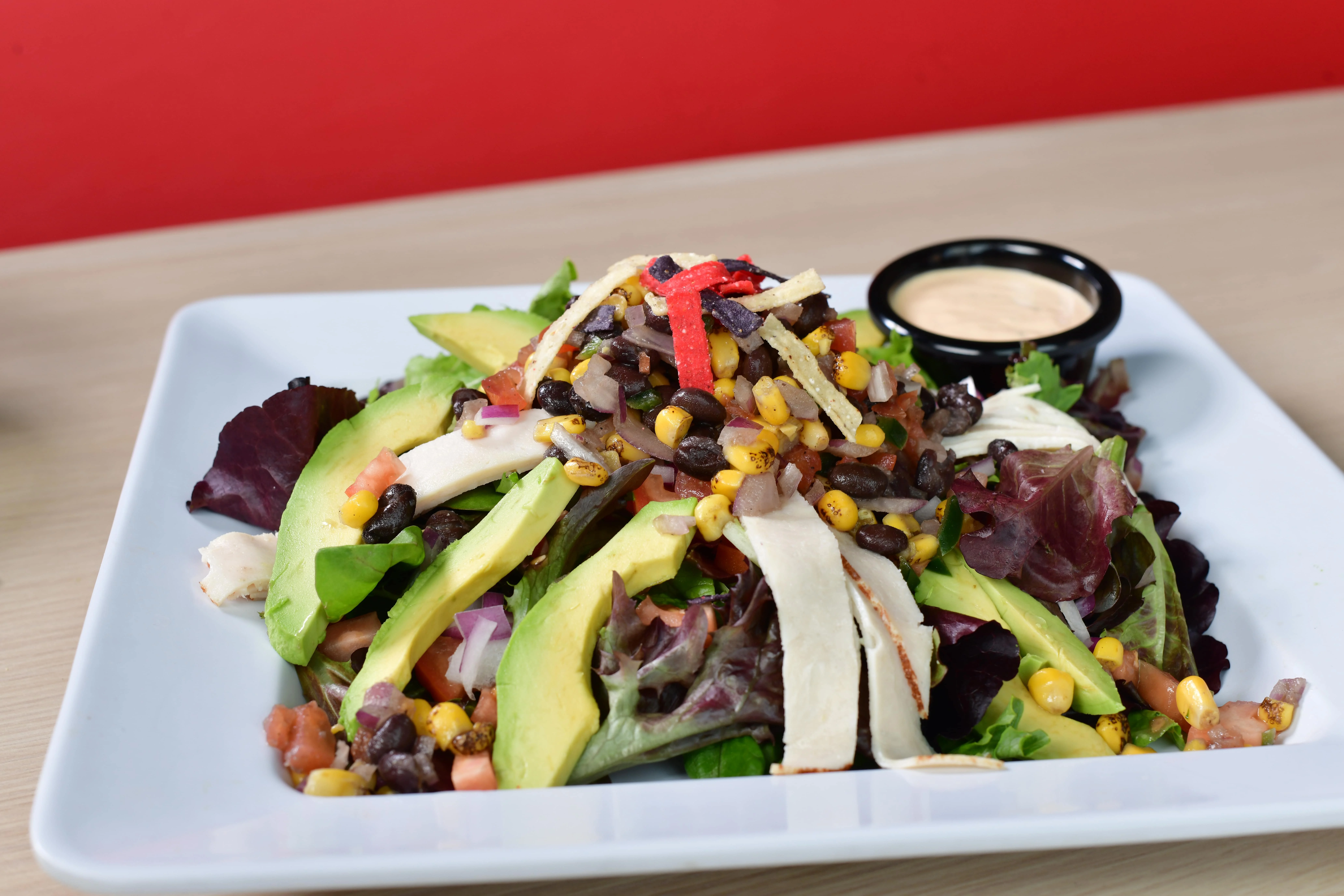 Fresh Mexican chicken salad with avocado and black beans