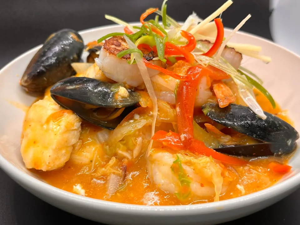 Spicy seafood laksa with shrimp and mussels