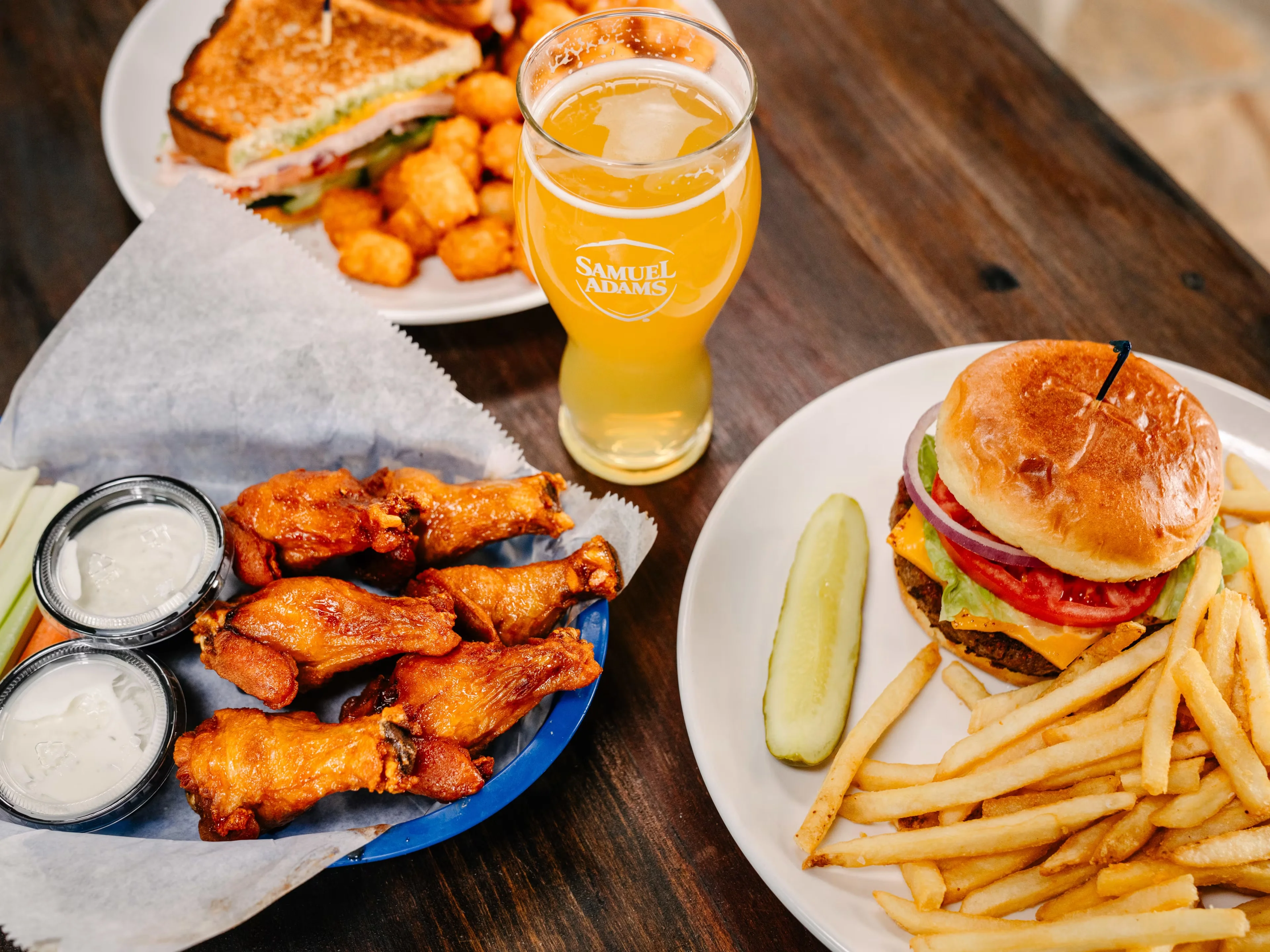 Classic American burger with wings and fries