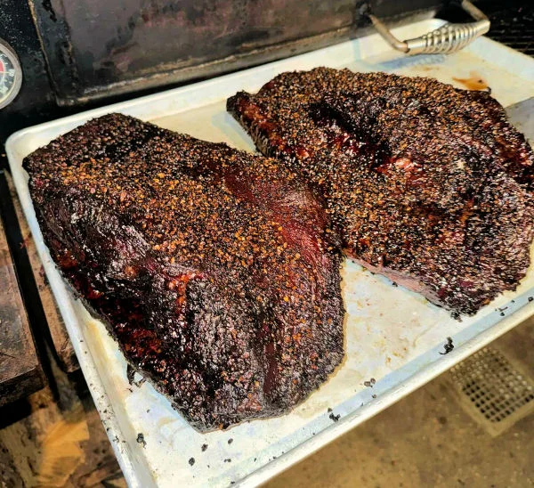 Texas-style smoked beef brisket with dark barbecue bark