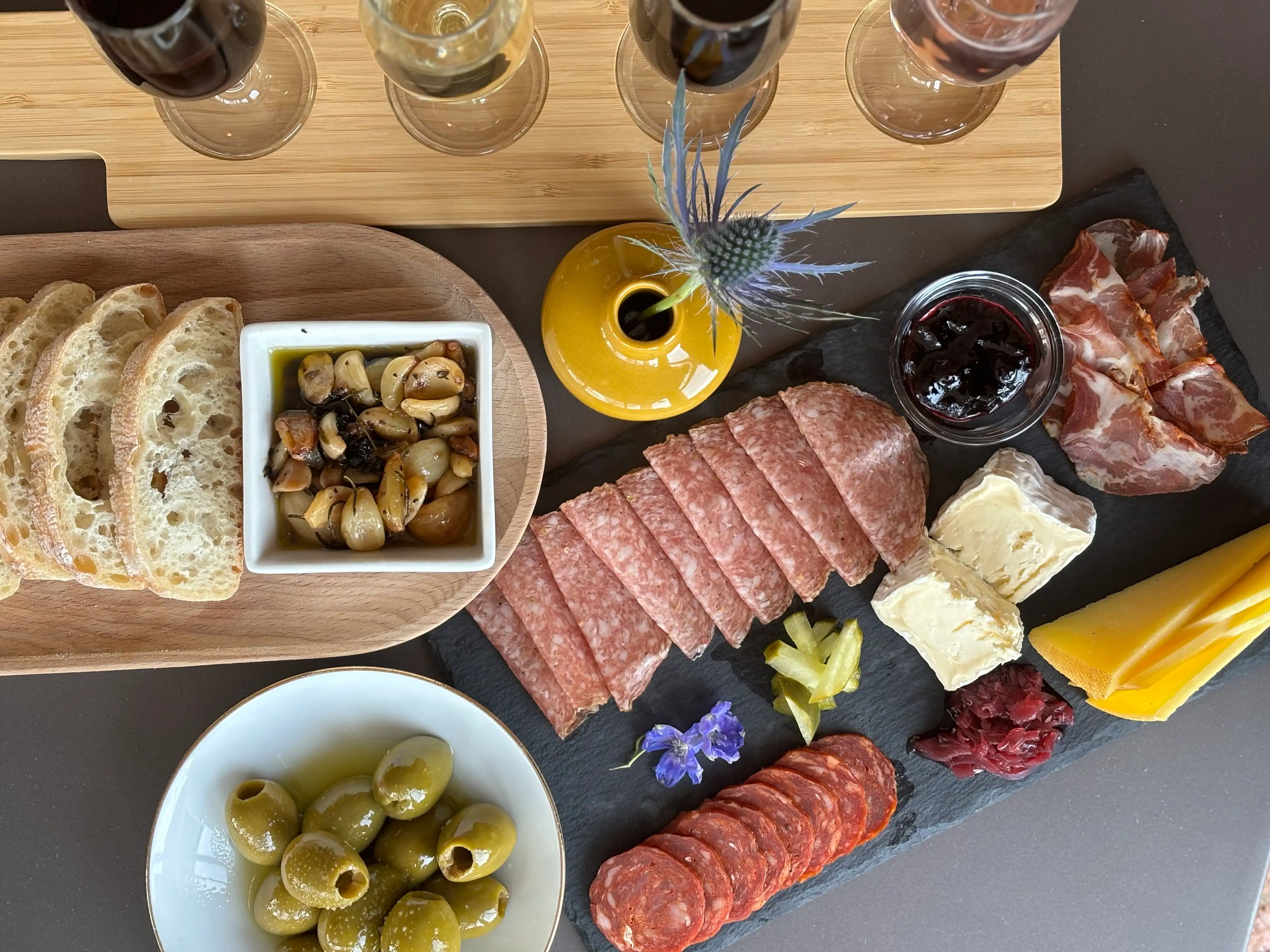 A charcuterie board and wine