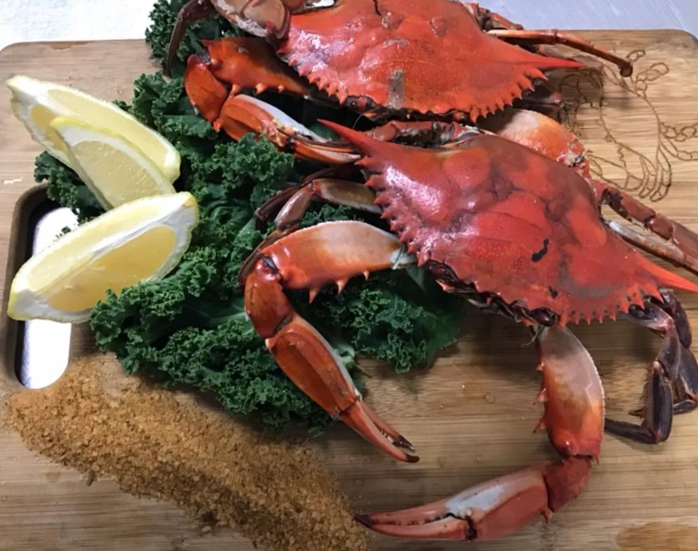 Freshly steamed Maryland crab on a wooden board