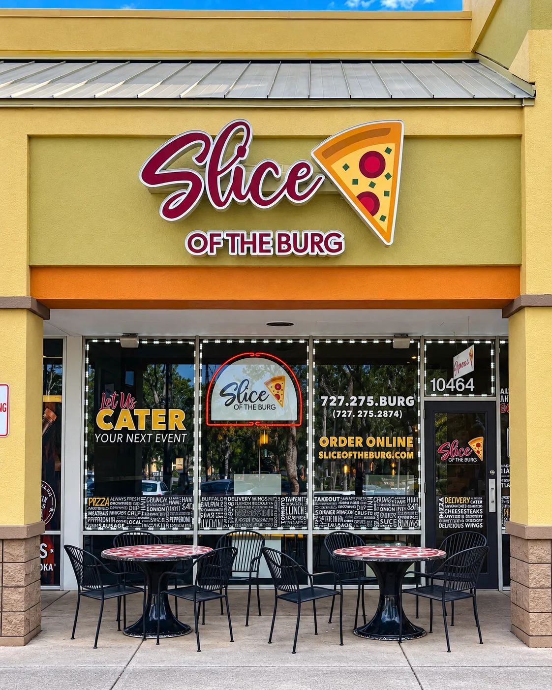 Exterior view of Slice of the Burg pizza restaurant with outdoor seating