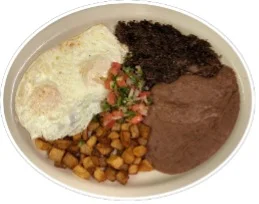 Classic Mexican breakfast plate with eggs and beans