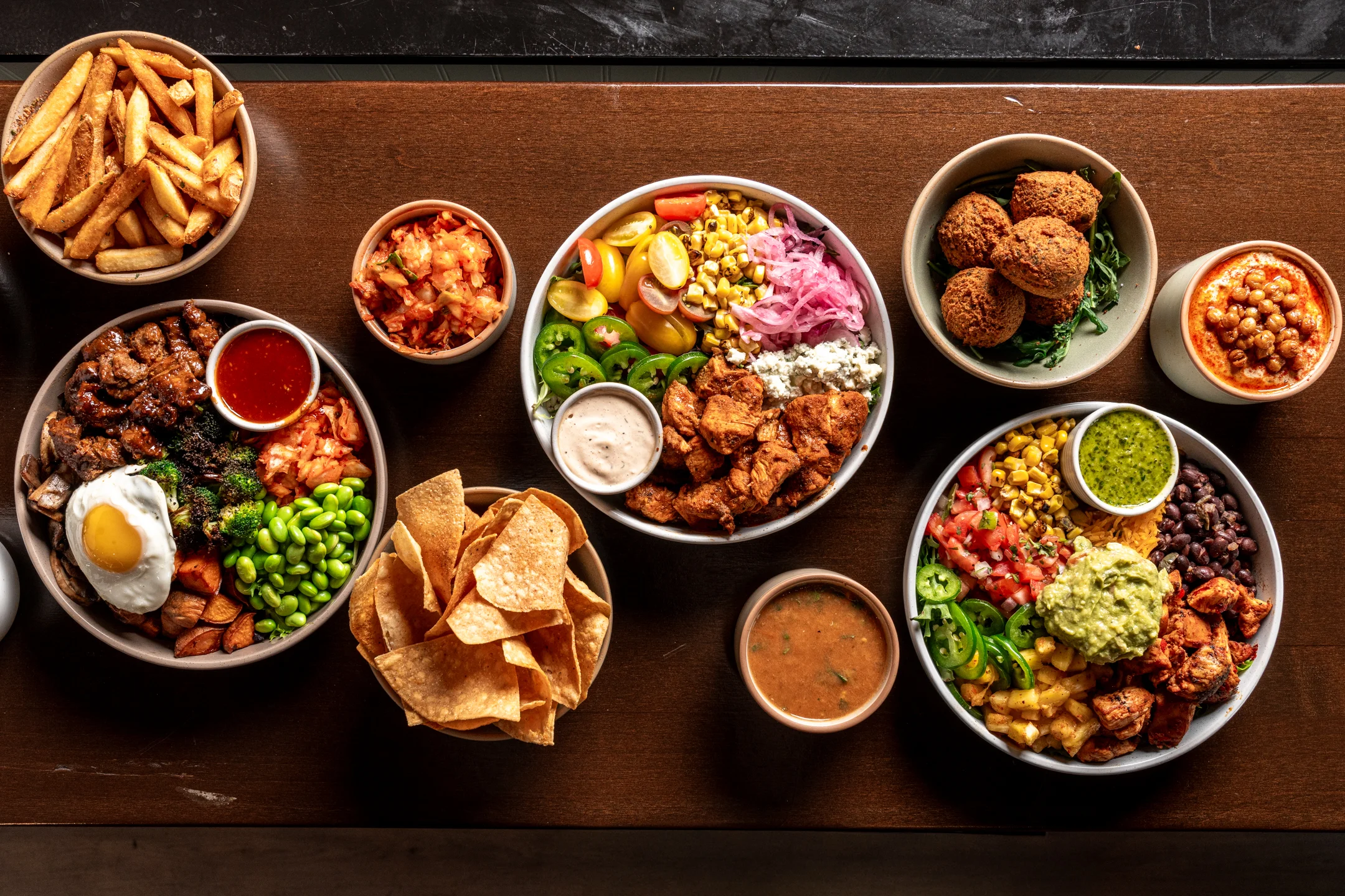 Colorful Mexican burrito bowl with shrimp and fresh toppings