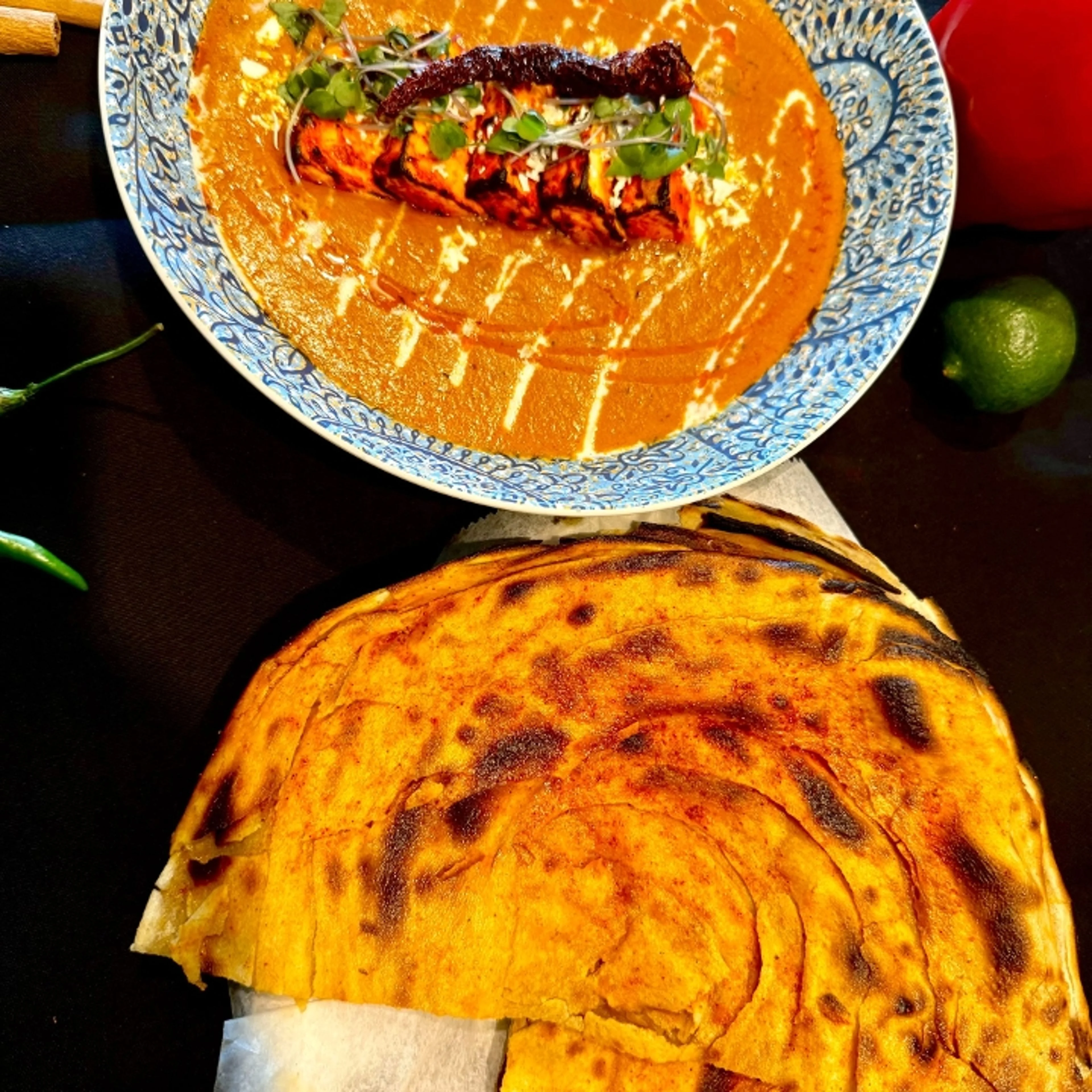 Butter chicken with naan bread, a classic Indian dish
