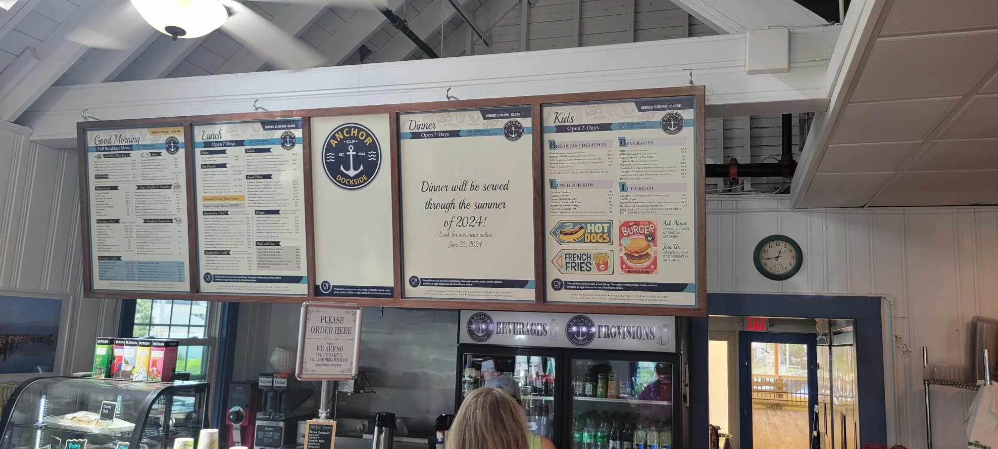 Restaurant menu display with breakfast, lunch, and kids' options