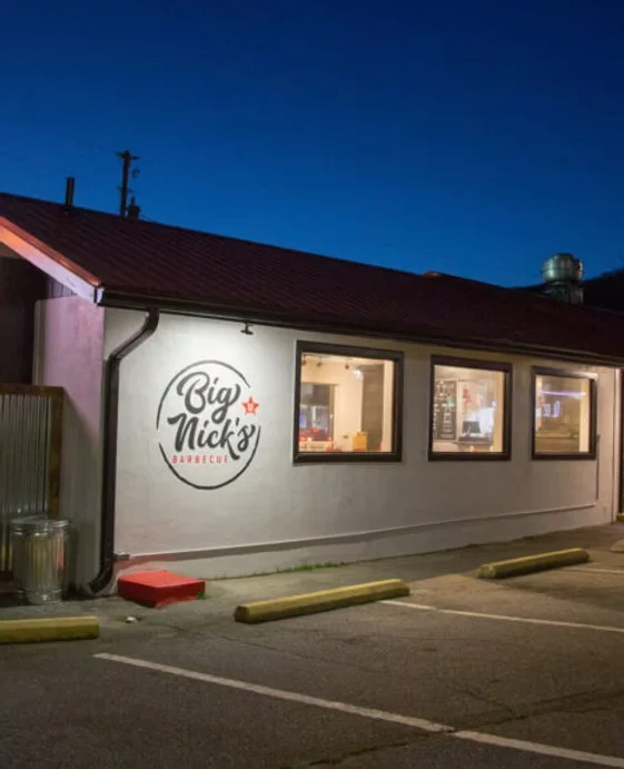 Exterior view of Big Nick's Barbecue restaurant at night