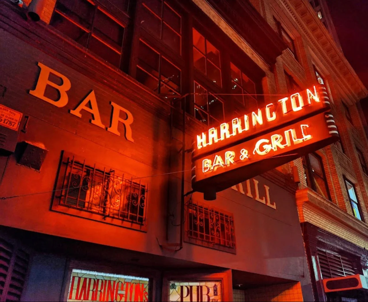 Harrington Bar & Grill illuminated sign at night
