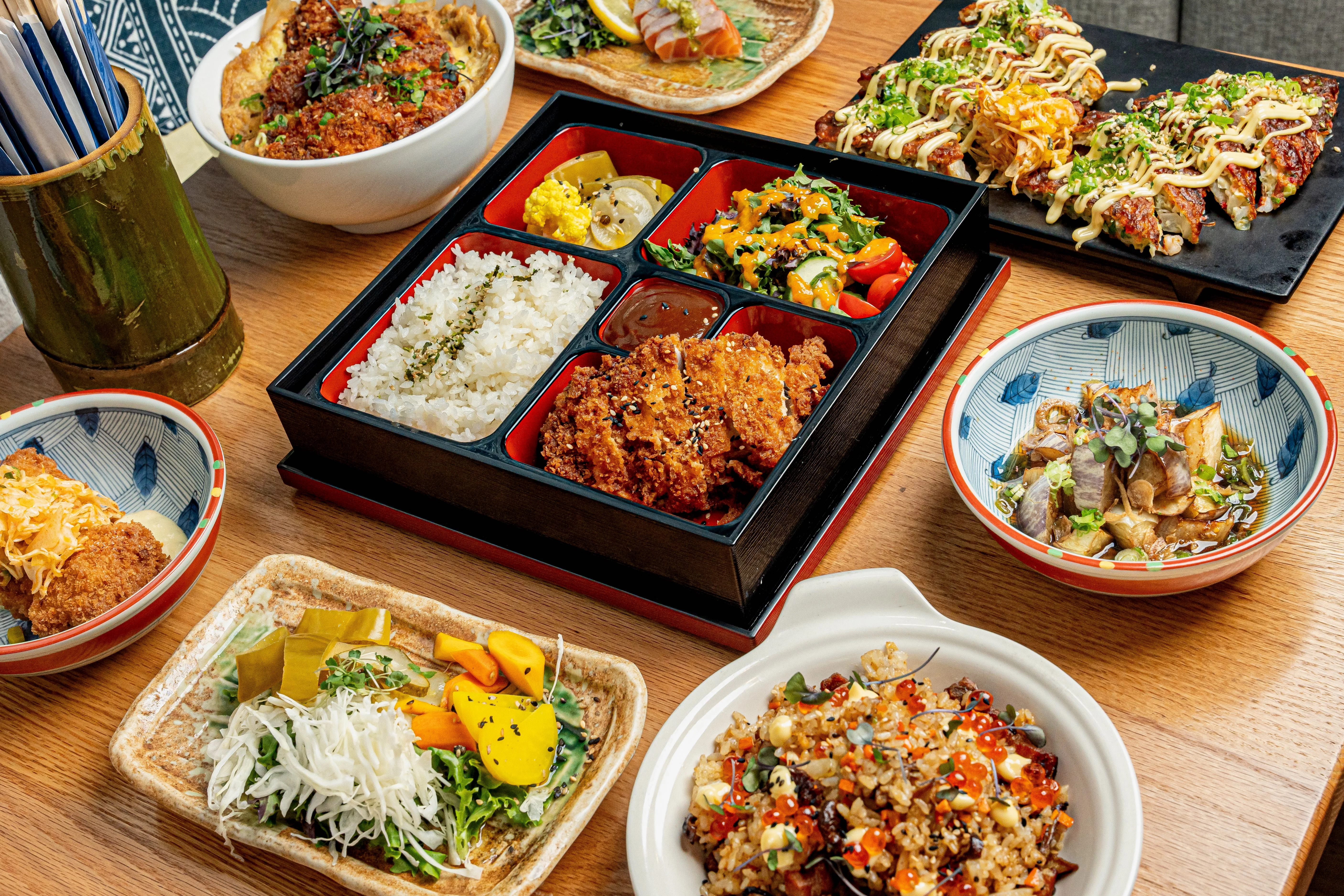A picture of a spread of authentic Japanese dishes