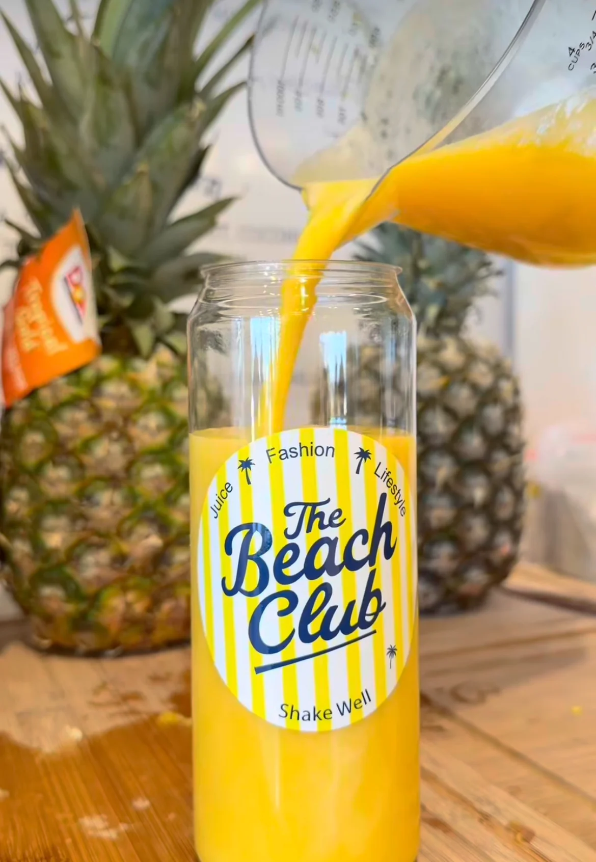 Fresh Juice being poured into a beach club can