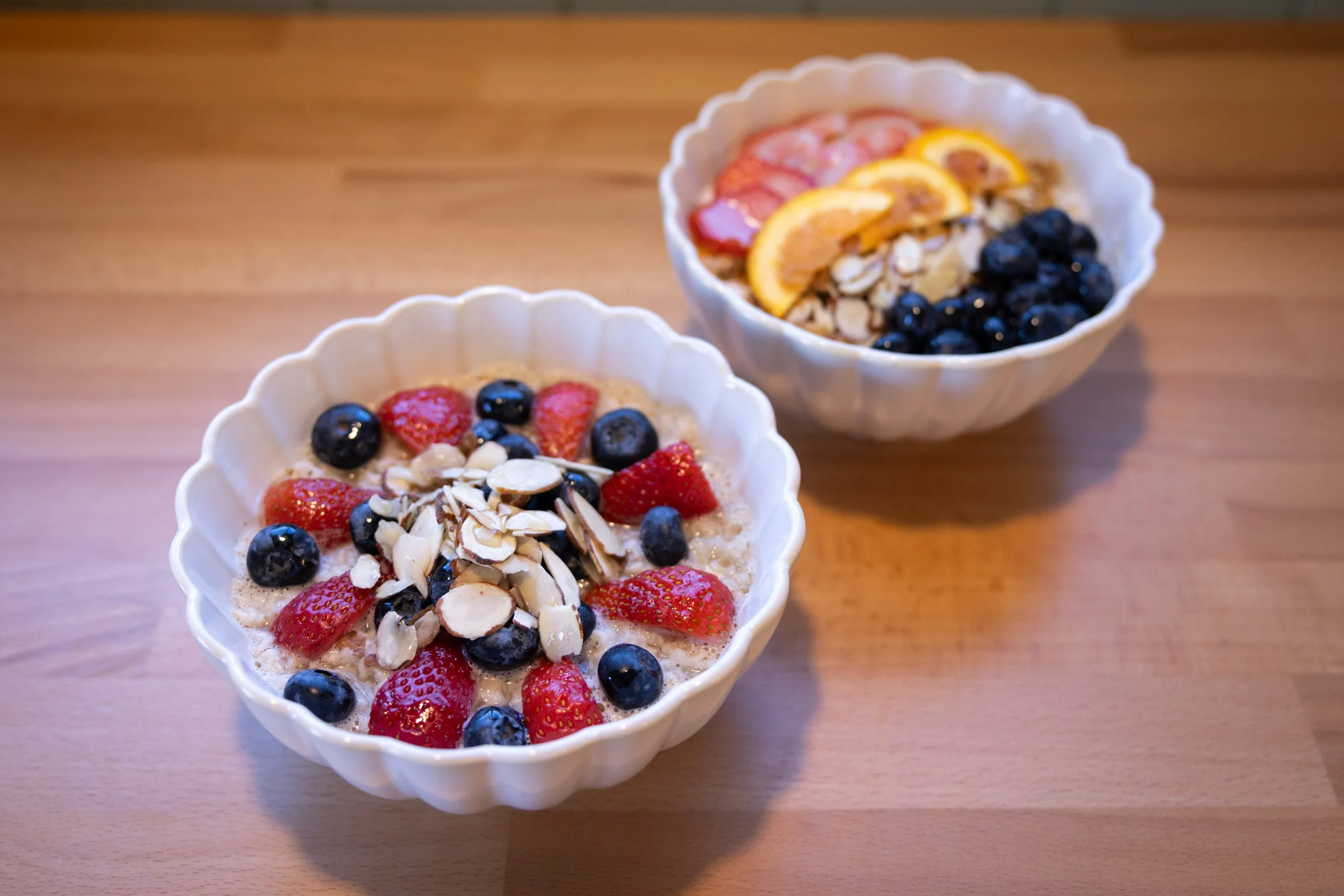 Healthy breakfast bowls with berries and almonds
