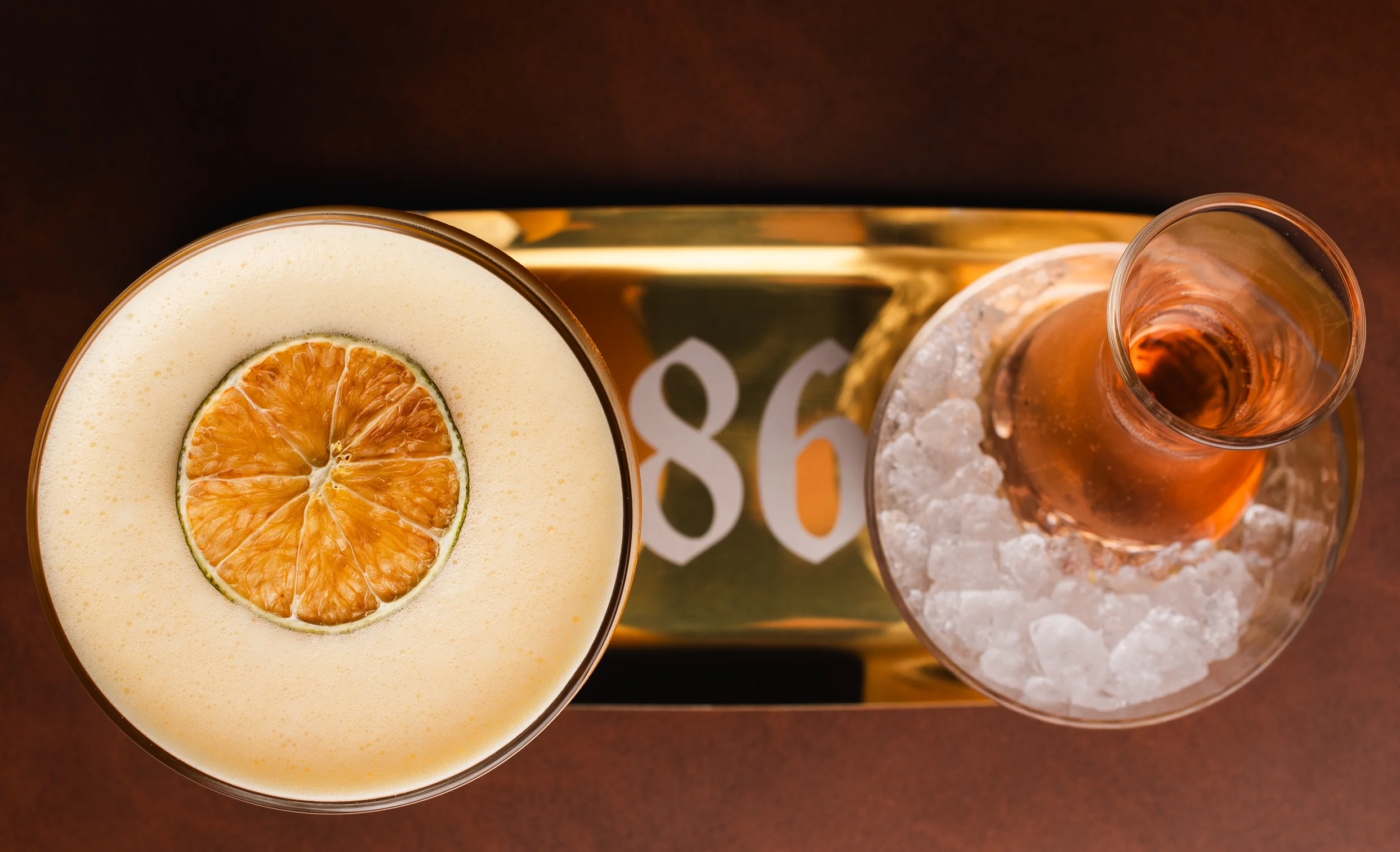 Stylish bar interior with wooden accents and a wide selection of spirits