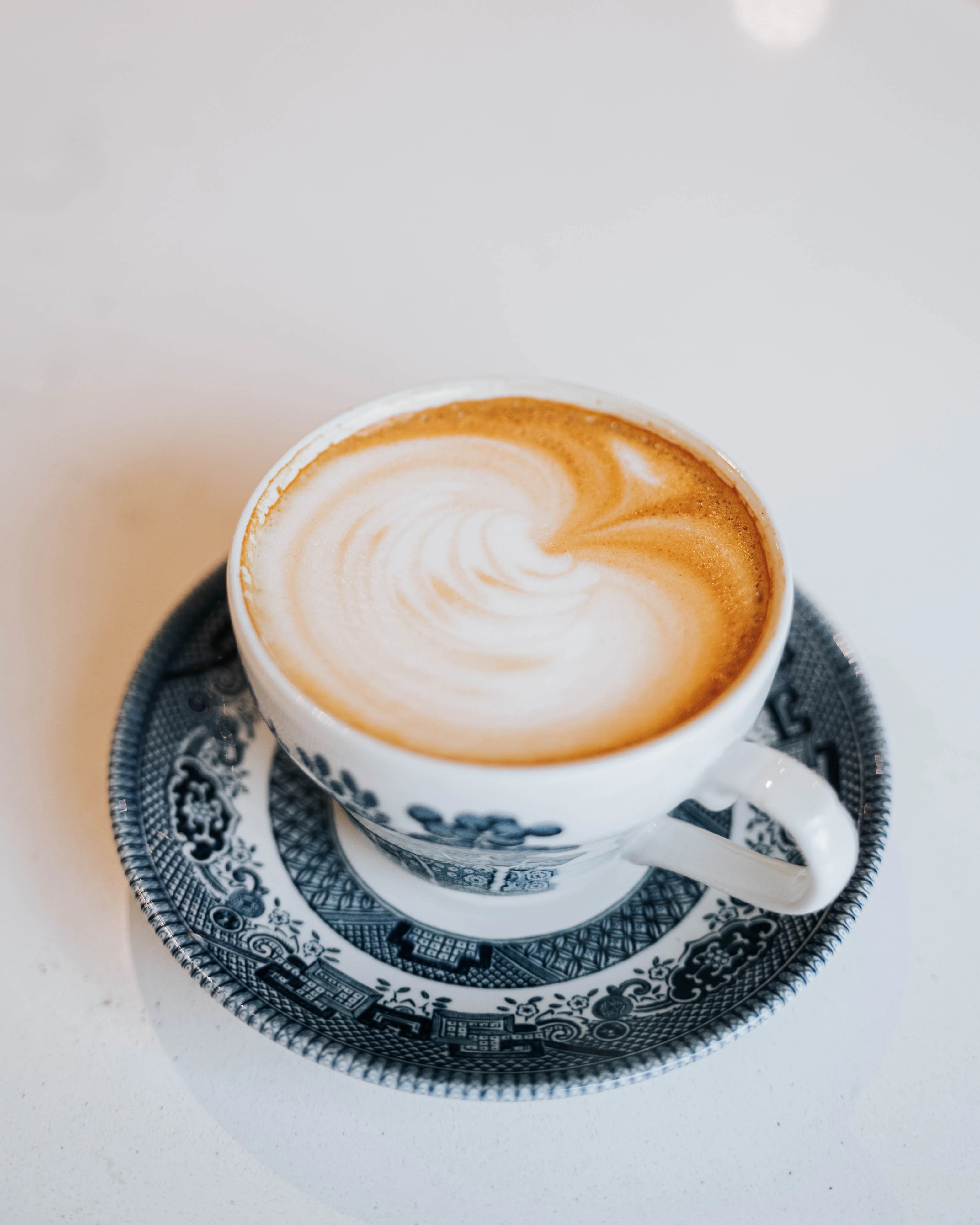 Events section (background is a cup of coffee)