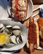 New England seafood platter with clam chowder and hot dogs