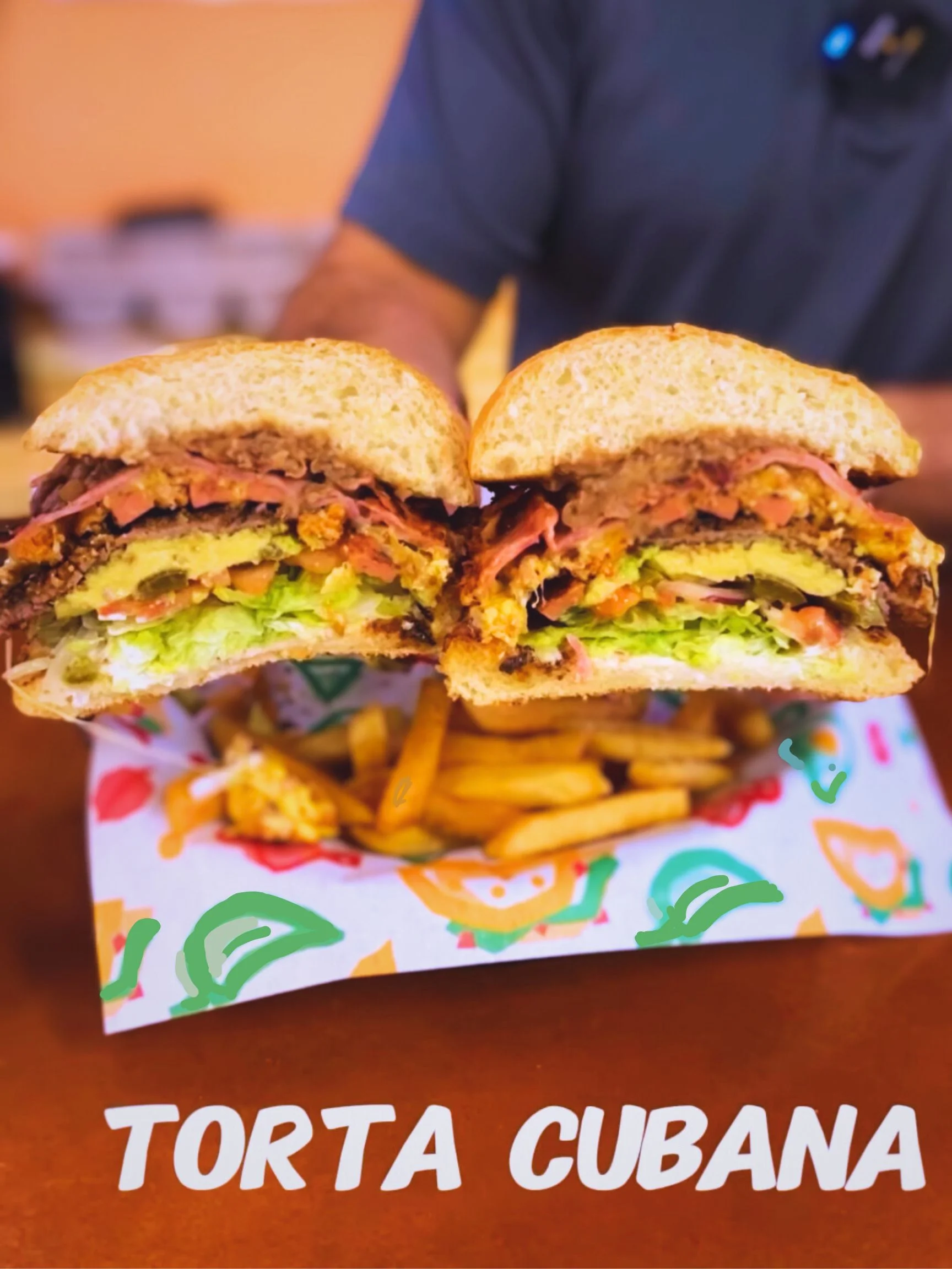 Delicious torta cubana with layers of meat and fresh toppings