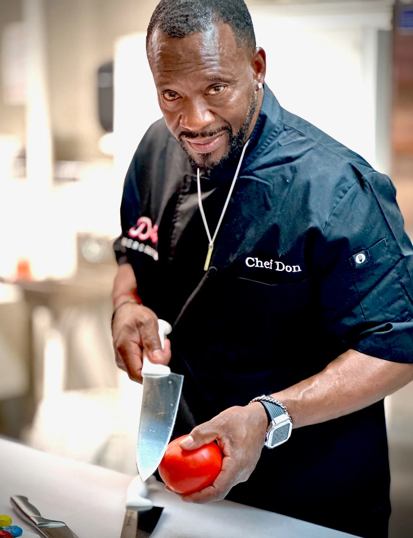 Chef preparing fresh ingredients in a professional kitchen