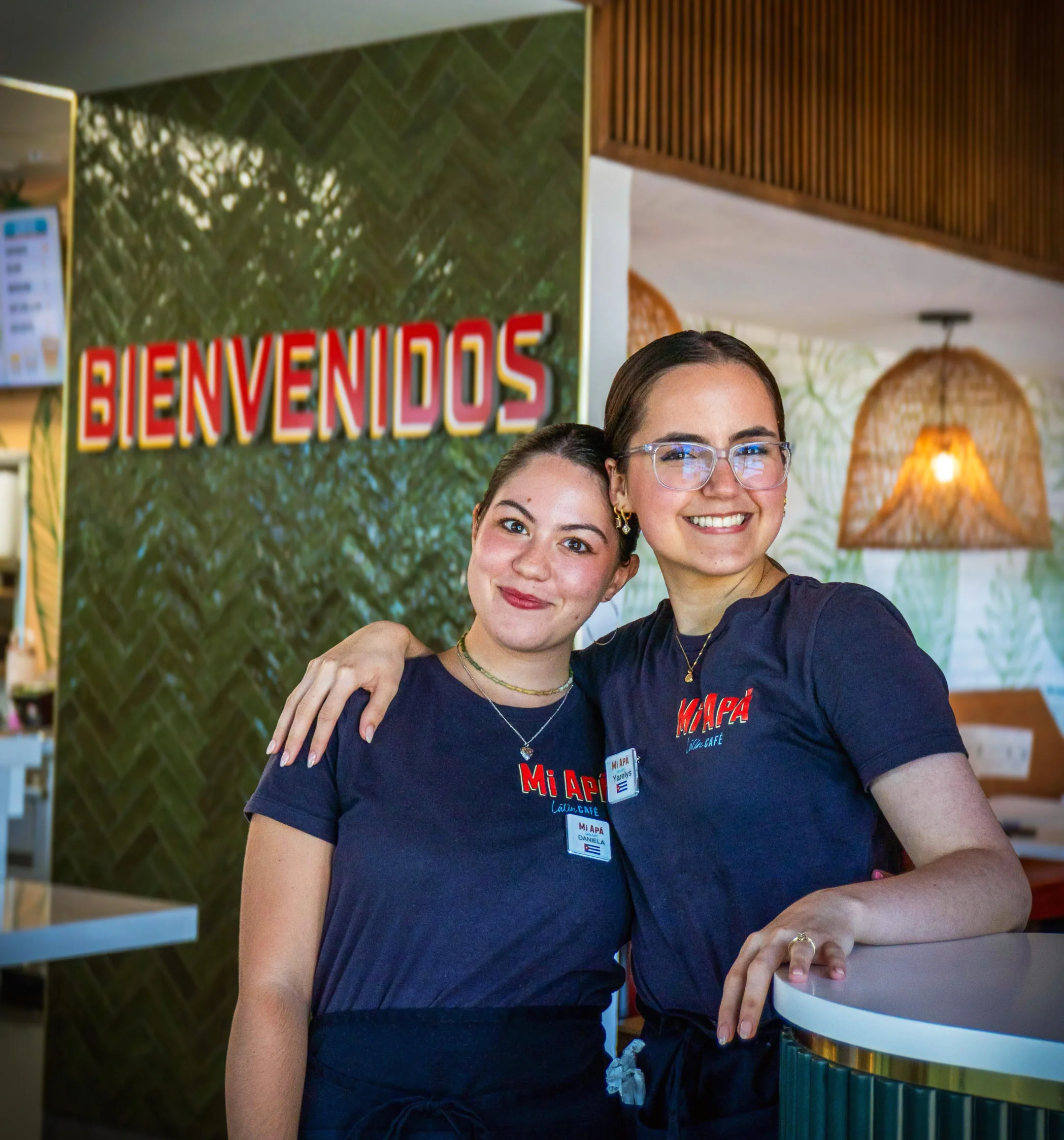 staff presenting cuban sandwich and miami sandwich