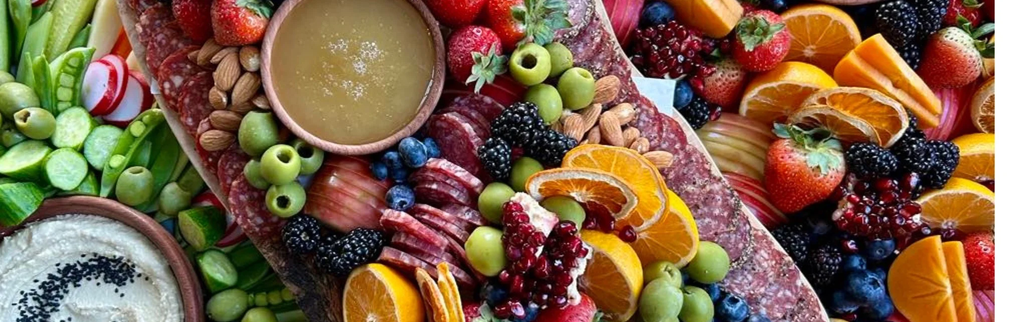 Artisan charcuterie board with fruits and nuts