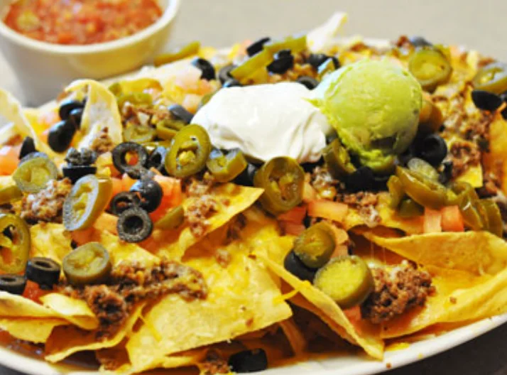 Loaded nachos with beef and toppings