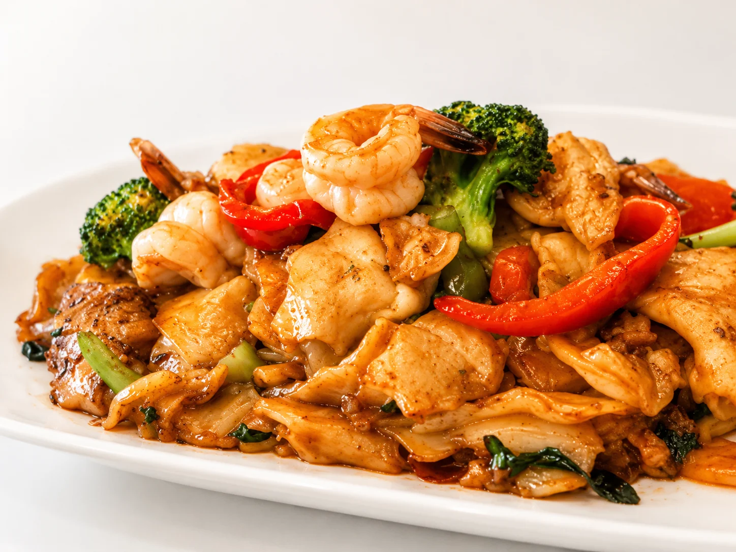 Stir-fried Thai pad see ew with shrimp and vegetables