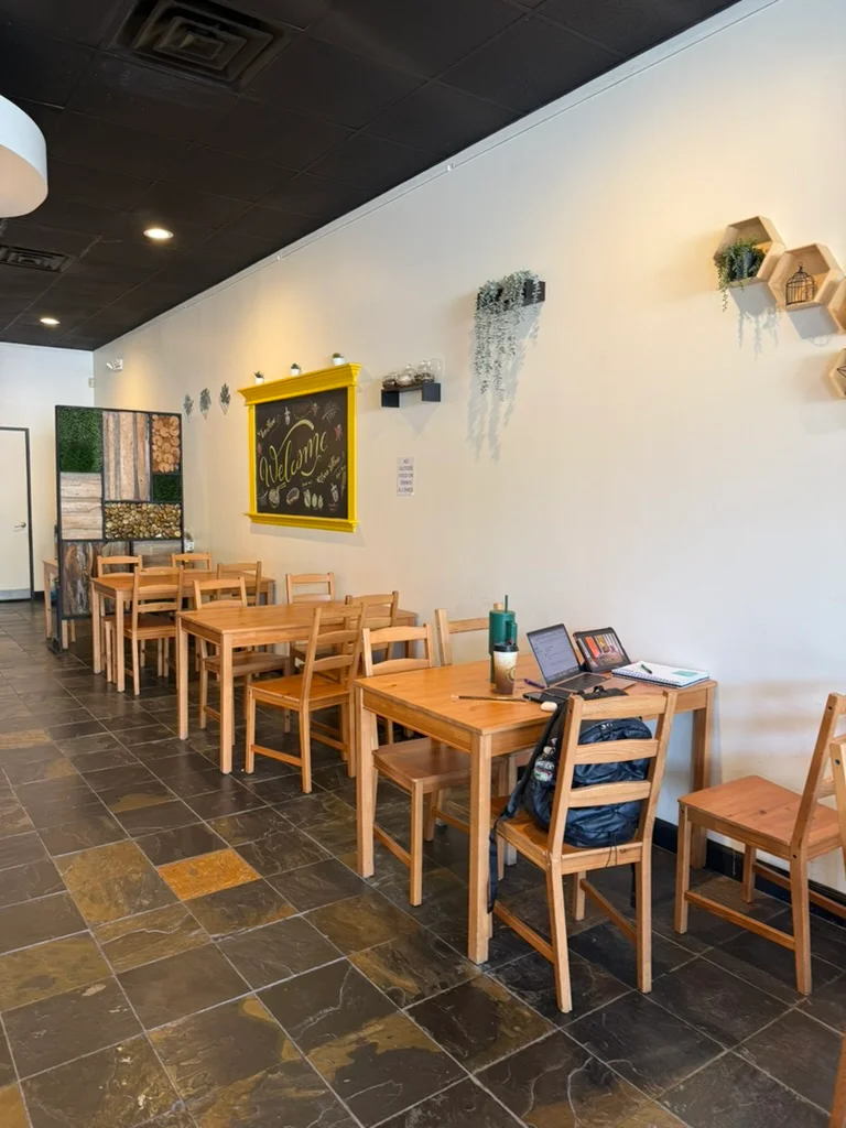 Cozy restaurant interior with wooden tables and welcoming decor