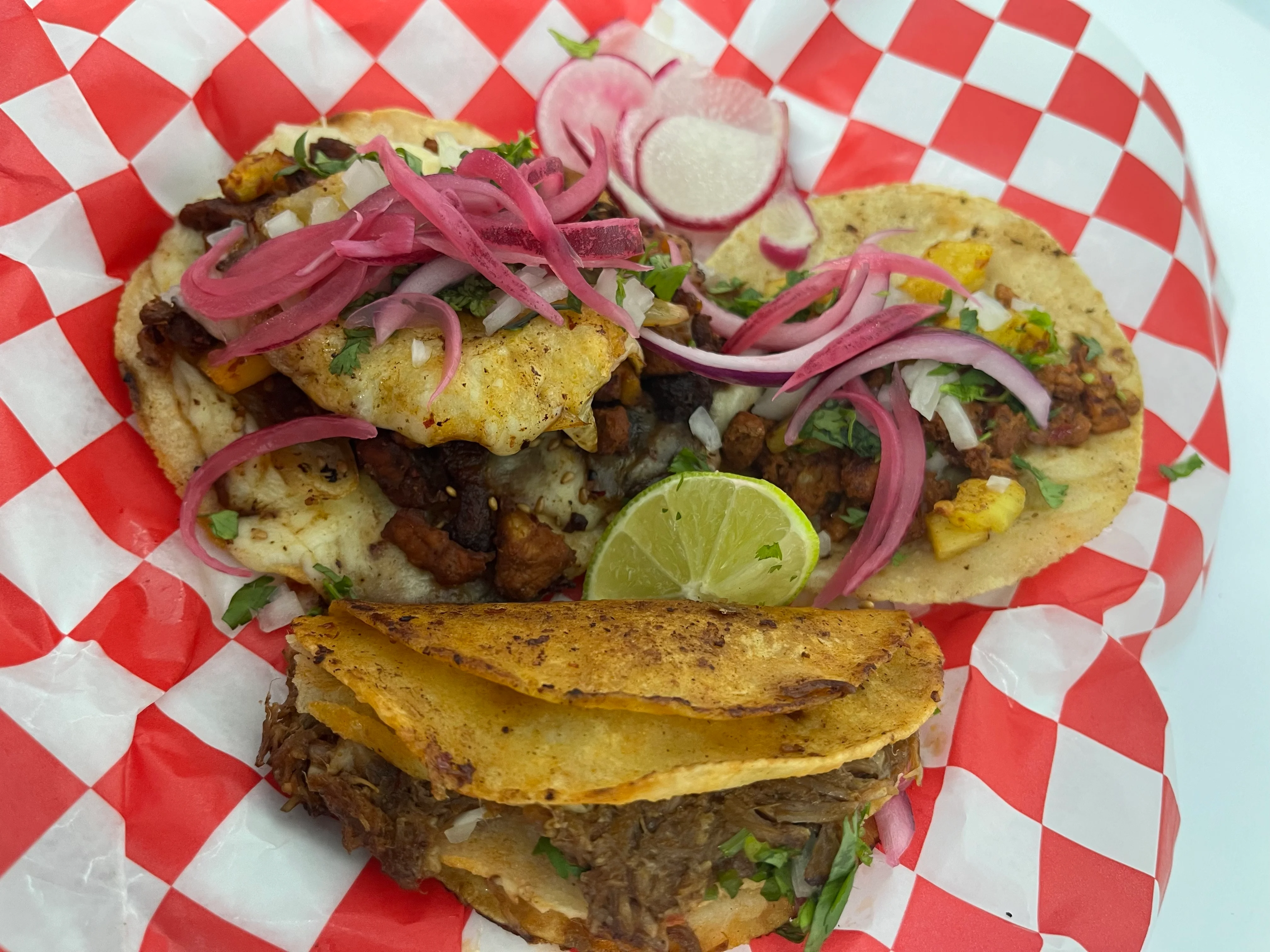 Authentic Mexican tacos with grilled meat and toppings