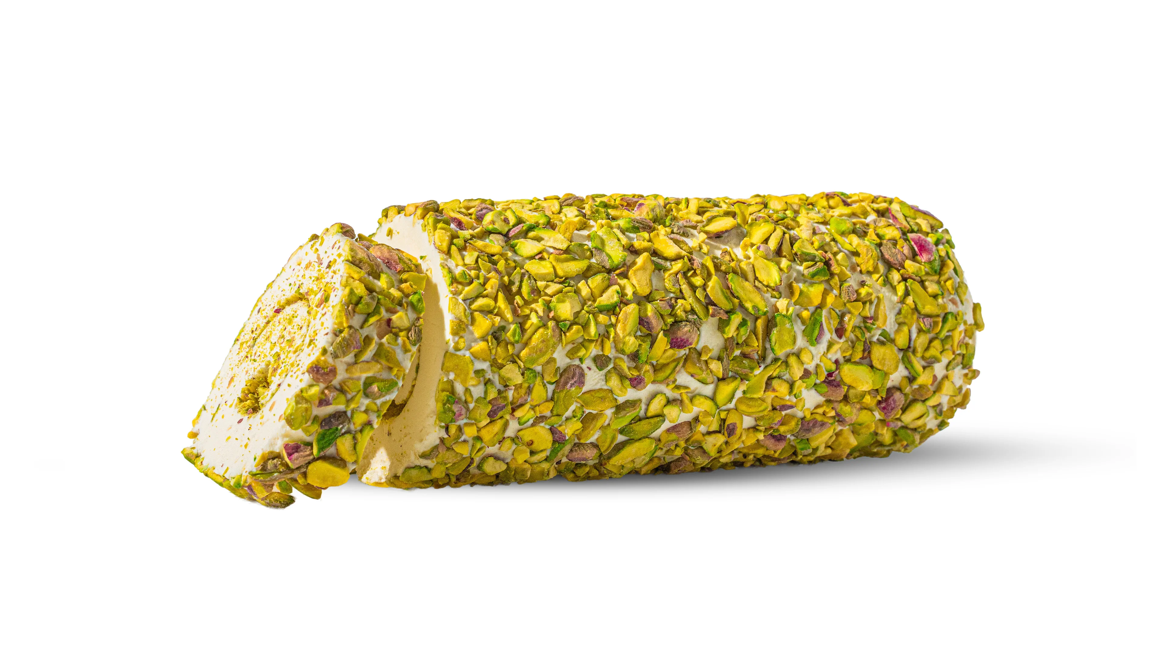 Pistachio cake slice with creamy layers and crushed pistachios