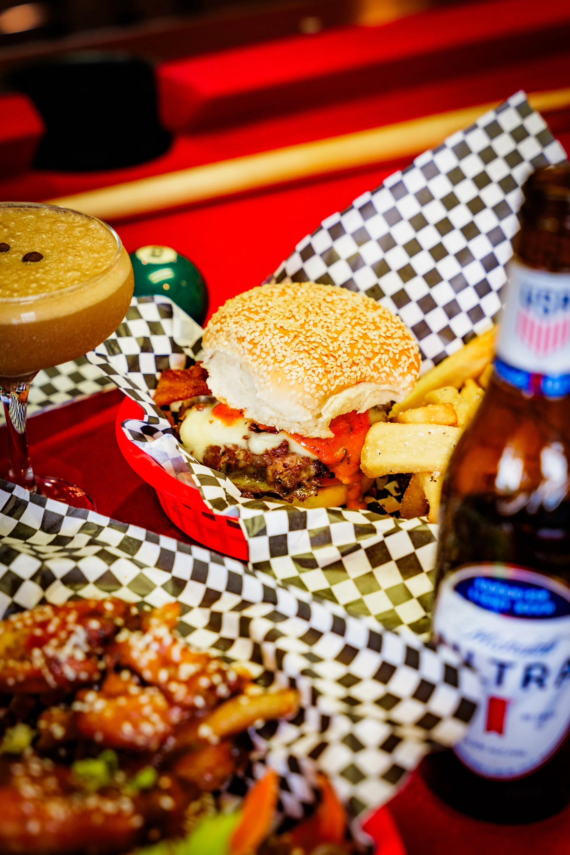 Juicy cheeseburger with fries in a casual dining setting