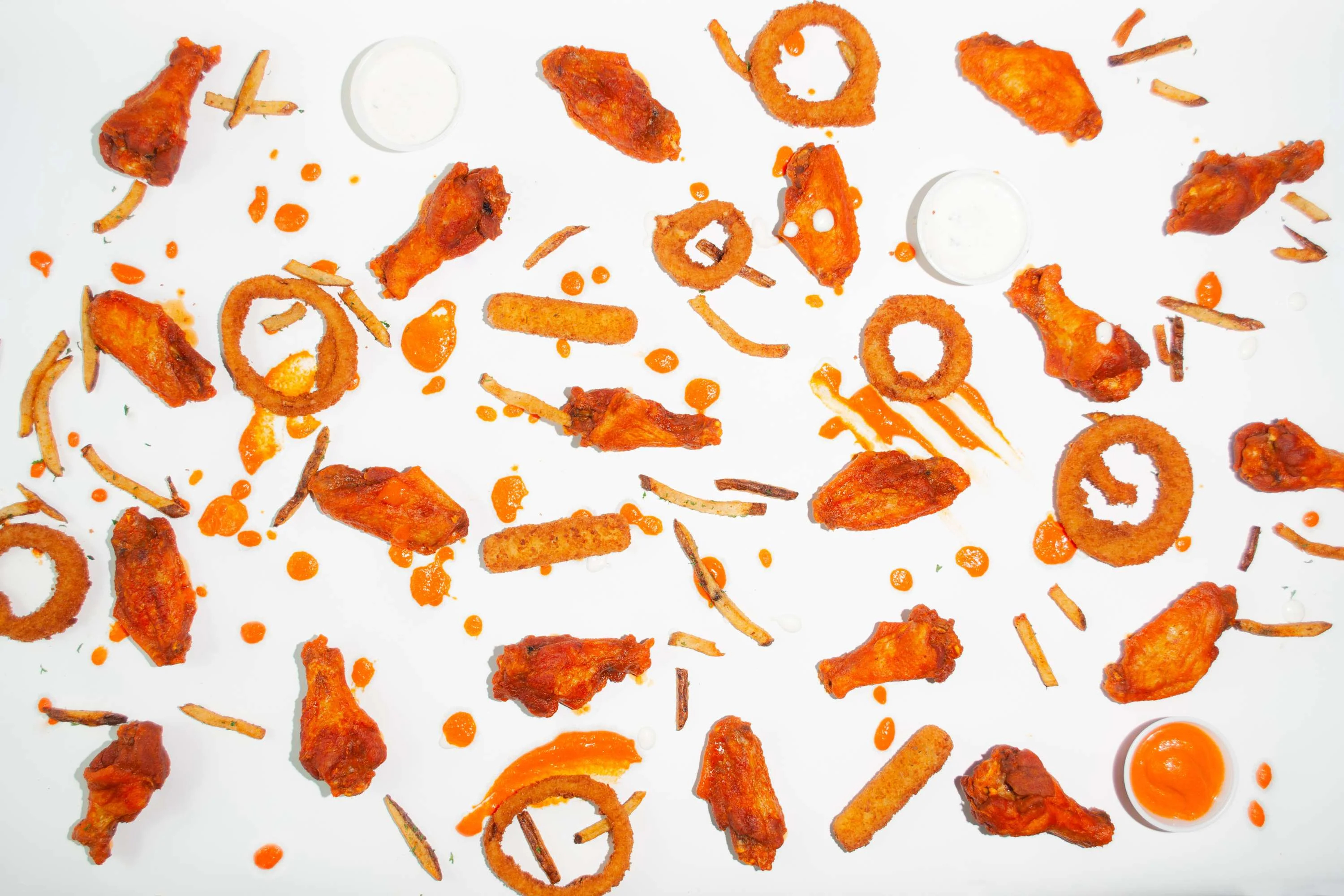 Crispy buffalo chicken wings with dipping sauces