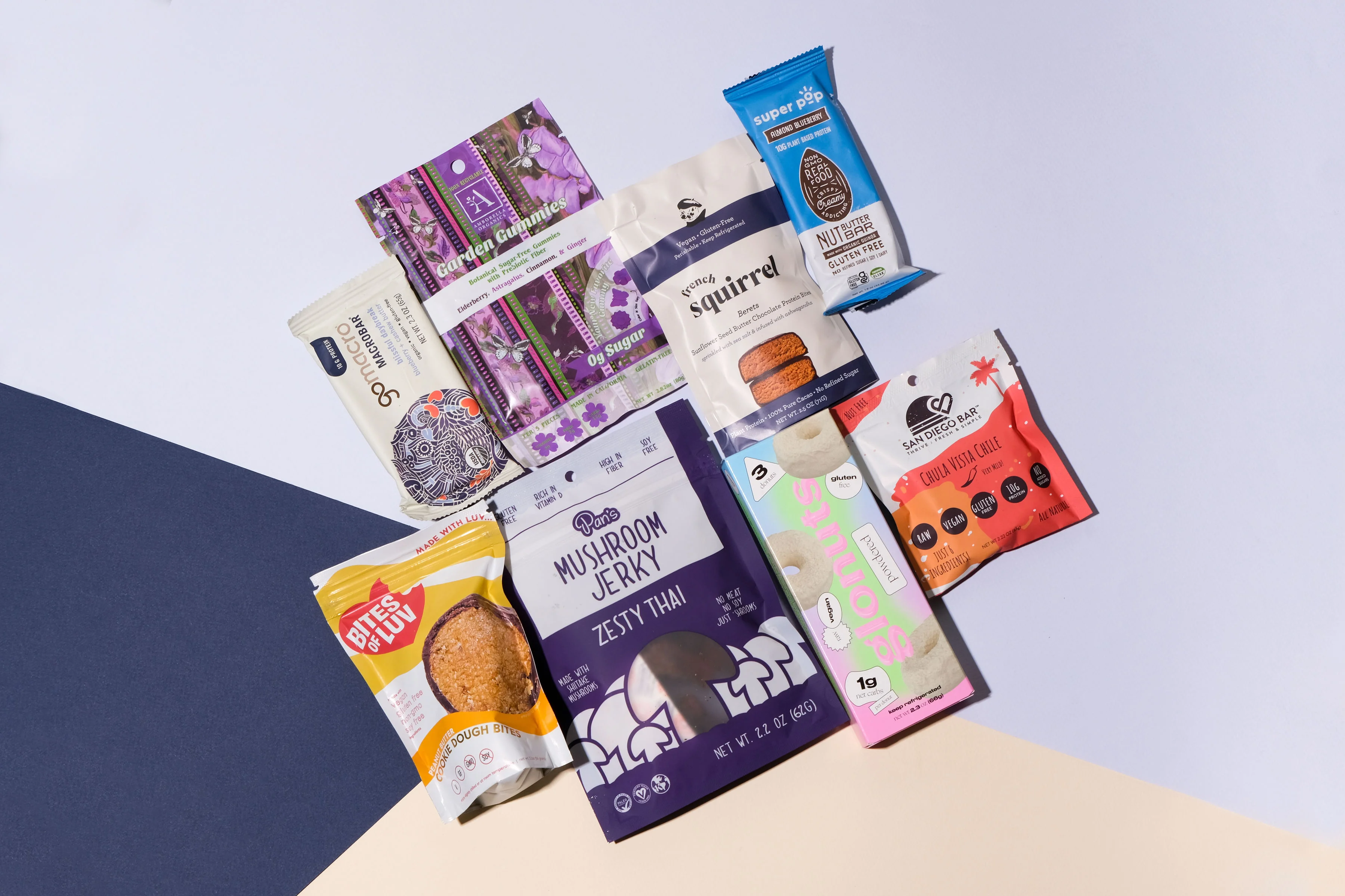 Variety of healthy snacks including jerky and nut bars