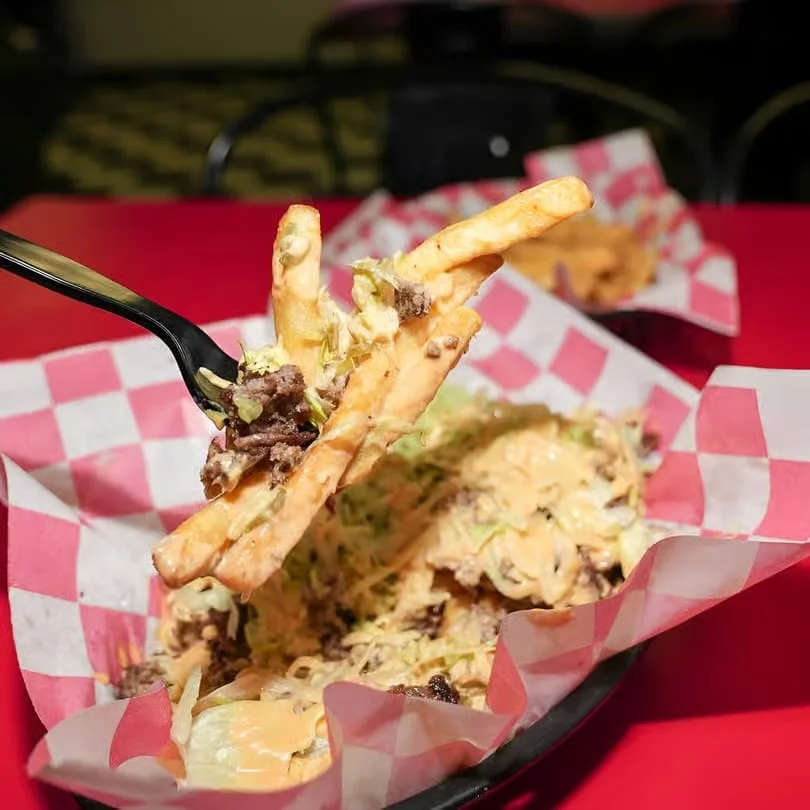Loaded nachos with beef and cheese sauce
