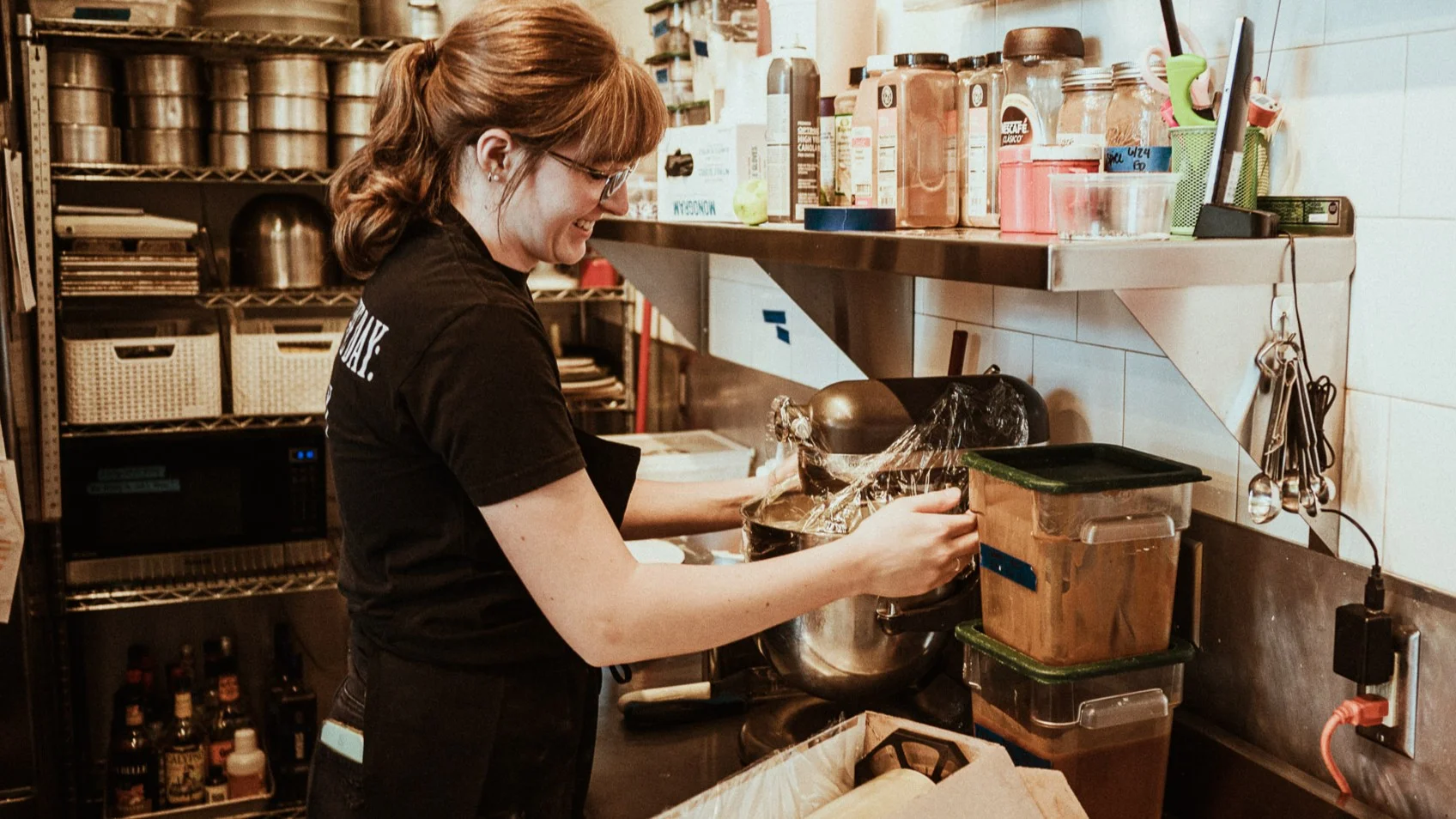 Baker preparing dough in a cozy kitchen