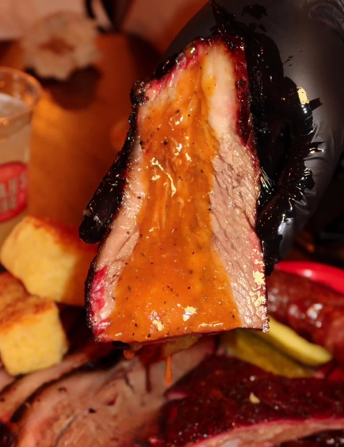 Smoked brisket slice with rich barbecue sauce