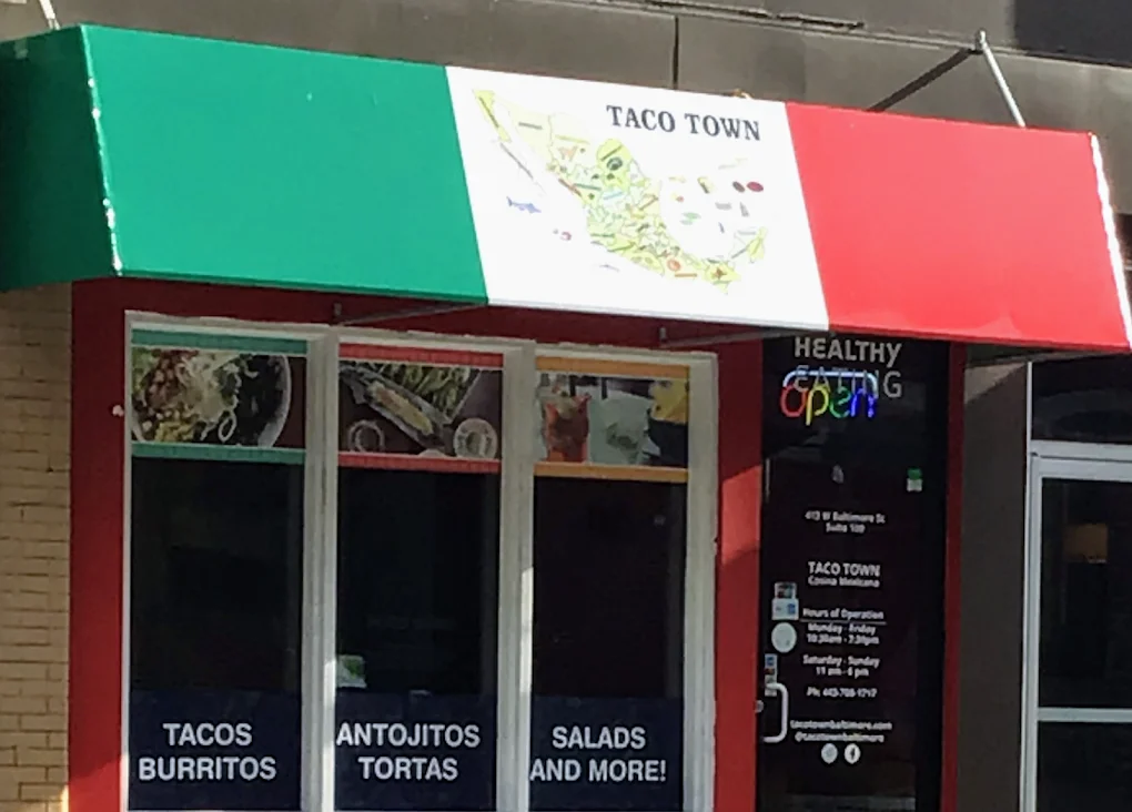 Colorful exterior of Taco Town restaurant featuring Mexican cuisine