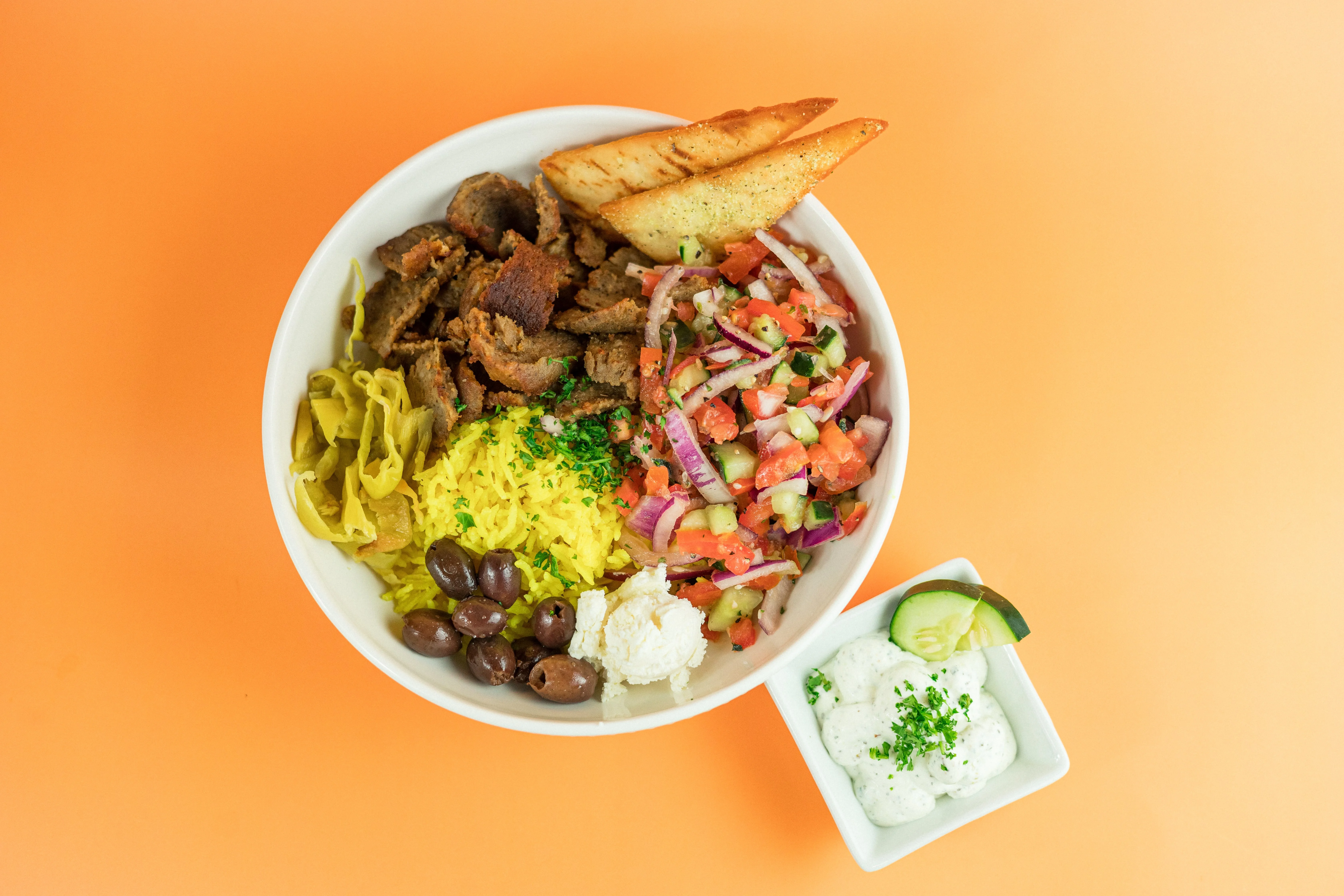 Original Greek bowl with gyro meat fresh vegetables and feta from Santorini's near South Jordan to Bluffdale, Draper, and Herriman, Utah