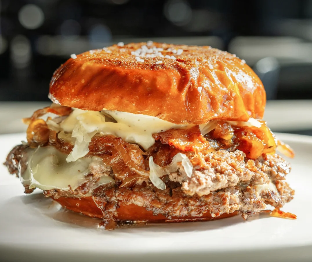 Jalapeño popper burger with crispy onions