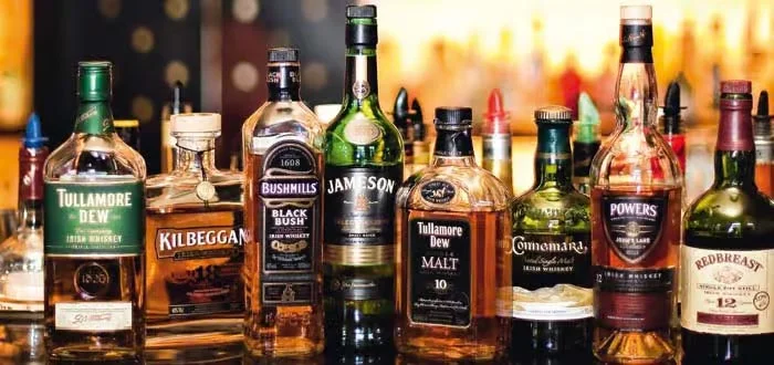 Selection of premium Irish whiskeys on a bar counter