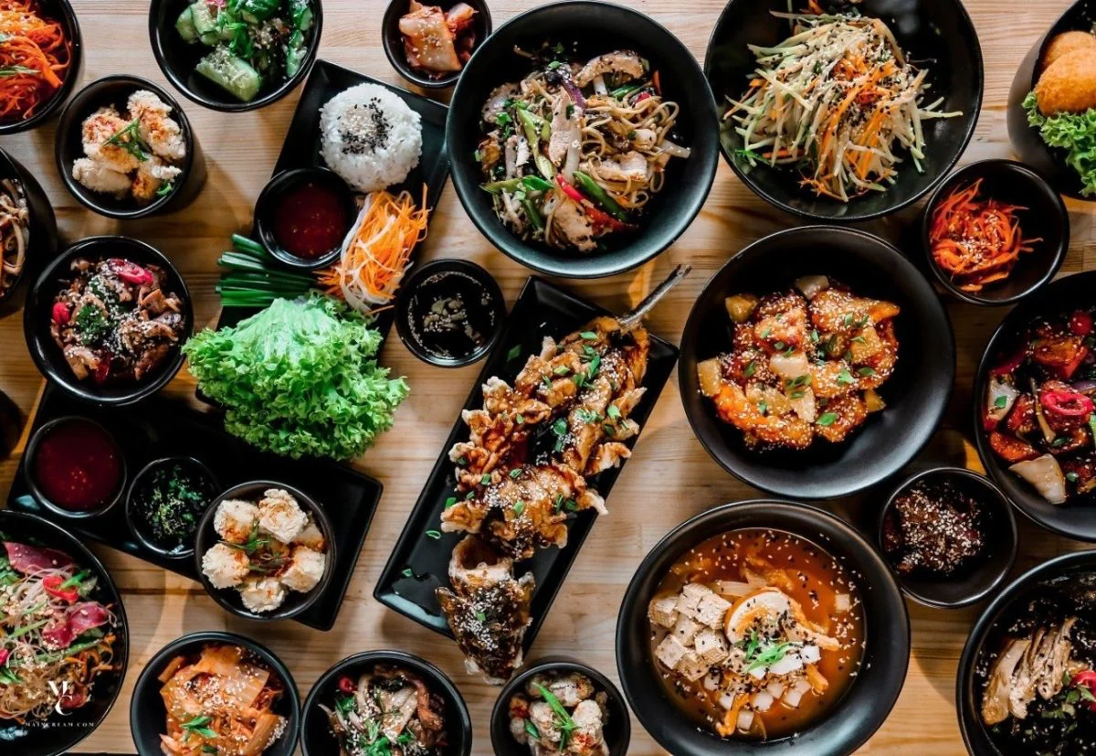 Assorted Asian dishes including Korean BBQ and Japanese sushi