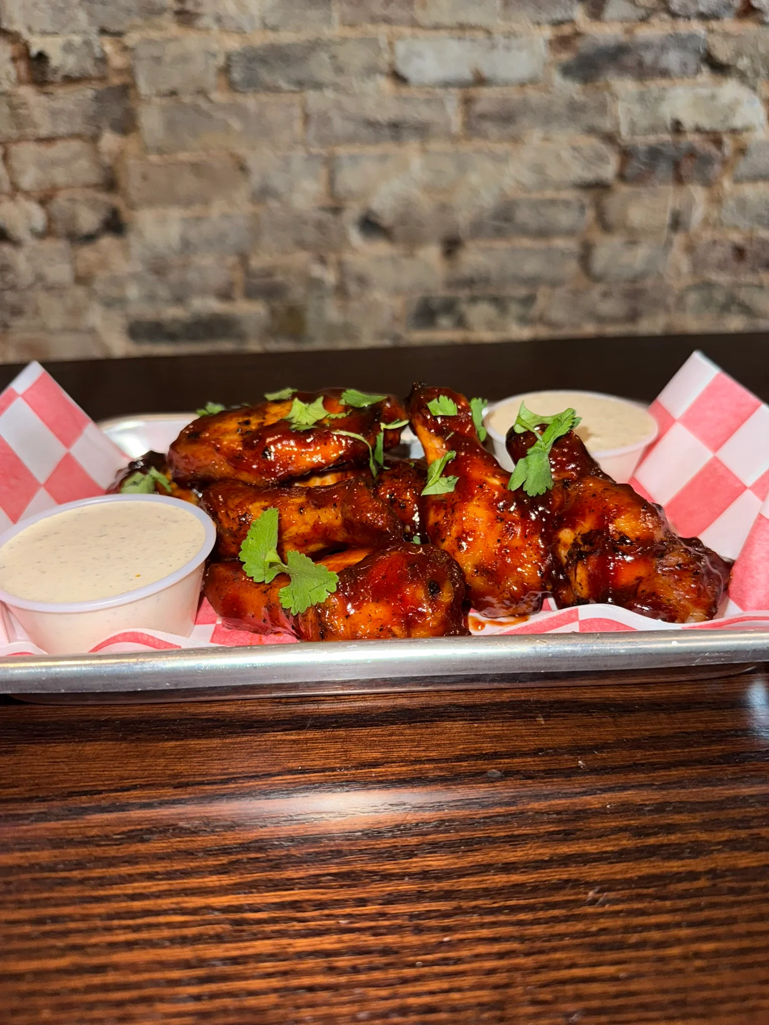Spicy barbecue chicken wings with dipping sauce