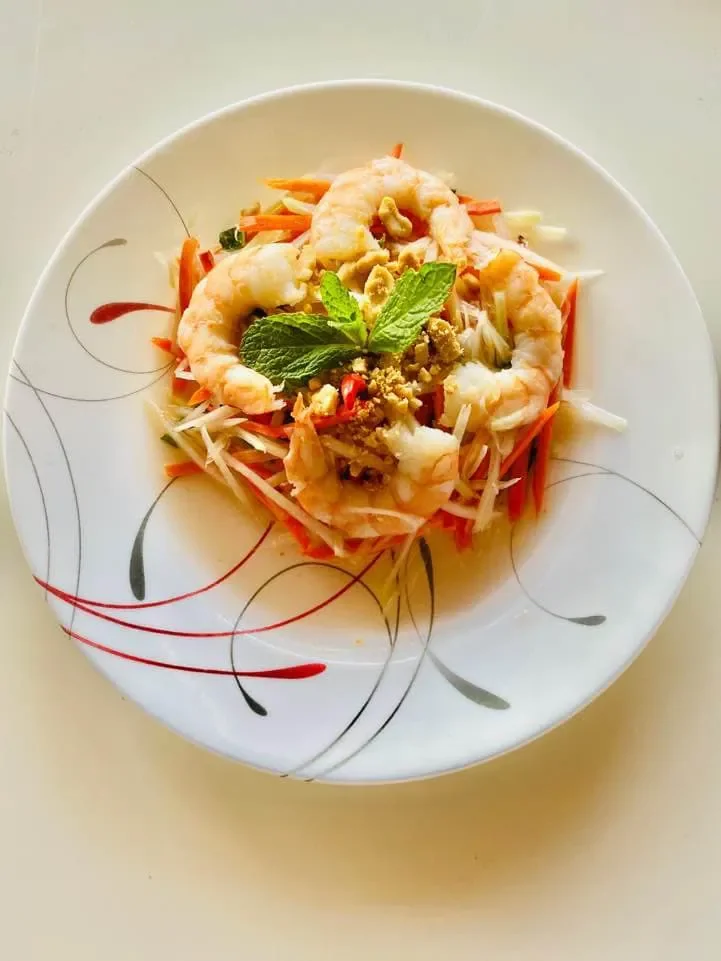Thai shrimp salad with fresh vegetables and herbs