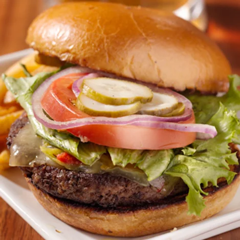 Classic American cheeseburger with fresh toppings